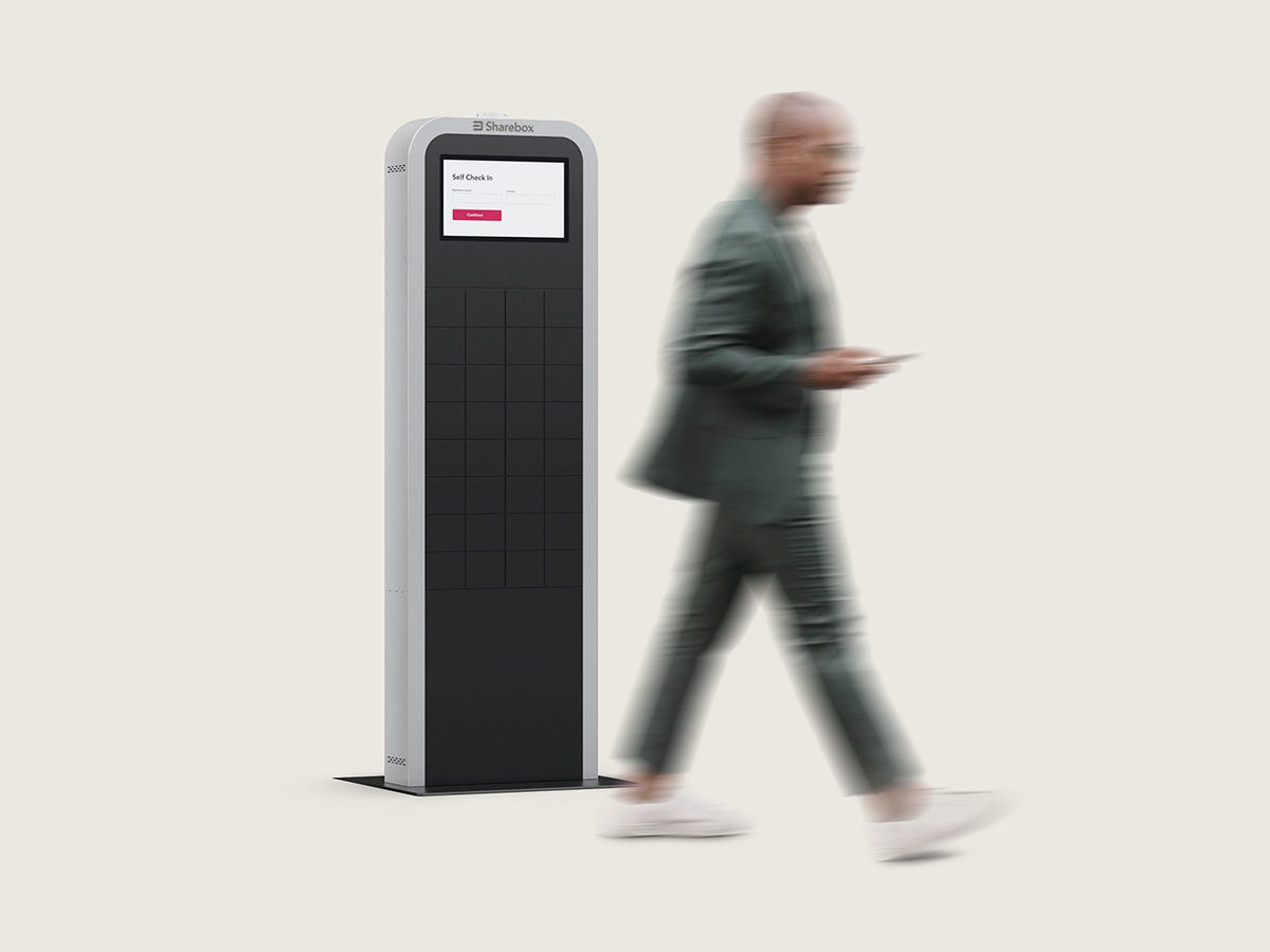 Man walking past Sharebox S cabinet