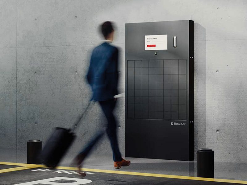 man walking towards sharebox w64 kiosk